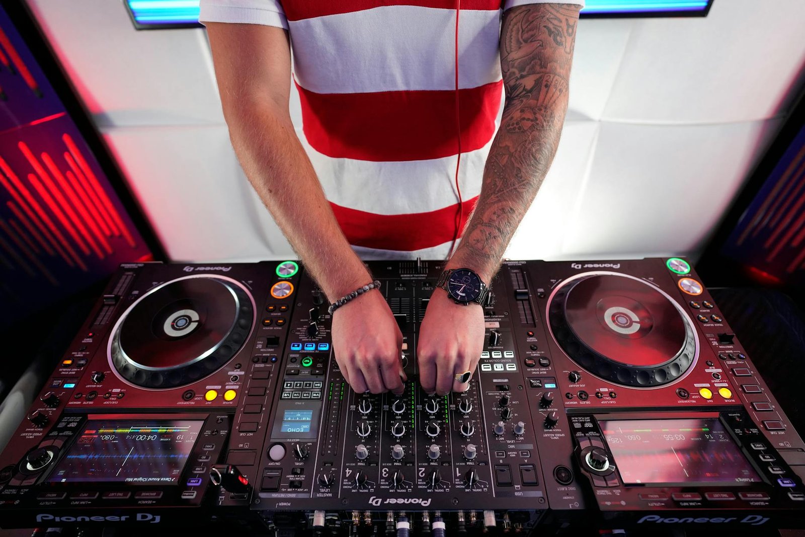 person using dj mixer